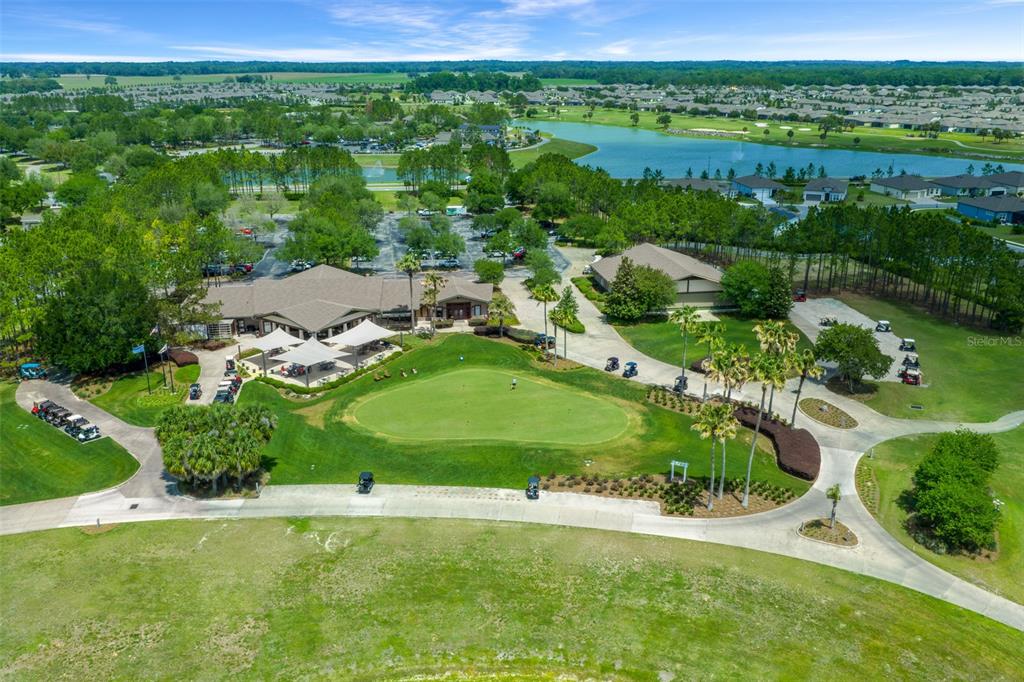 5947 Southwest 93rd Circle Ocala, FL 34481 - Photo 25 of 32 an aerial view of residential houses with outdoor space and street view