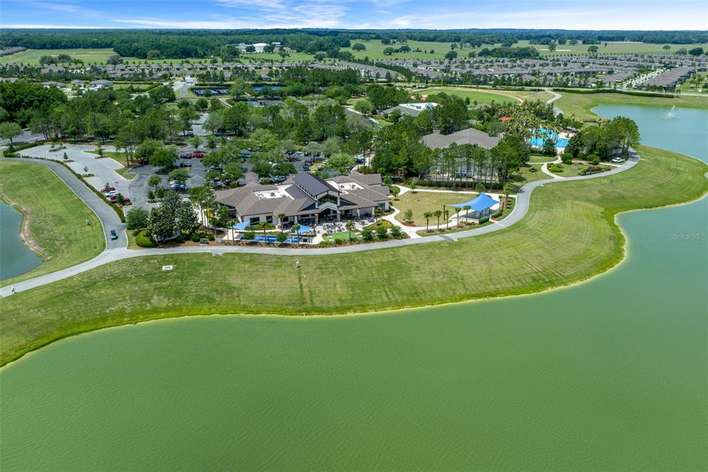 5947 Southwest 93rd Circle Ocala, FL 34481 - Photo 29 of 32 an aerial view of a house with a yard
