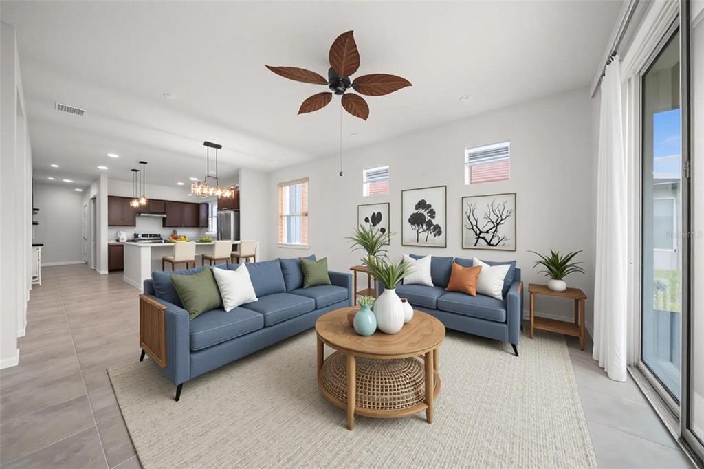 5947 Southwest 93rd Circle Ocala, FL 34481 - Photo 8 of 32 a living room with furniture kitchen view and a window