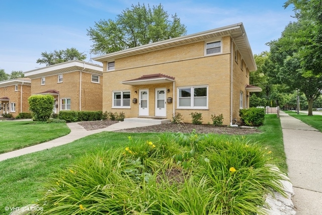455 Elmhurst Road Mount Prospect, IL 60056 - Photo 2 of 19 a front view of house with yard and green space