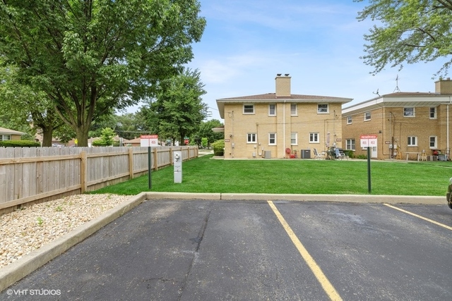 455 Elmhurst Road Mount Prospect, IL 60056 - Photo 19 of 19 a view of a park with plants and large trees