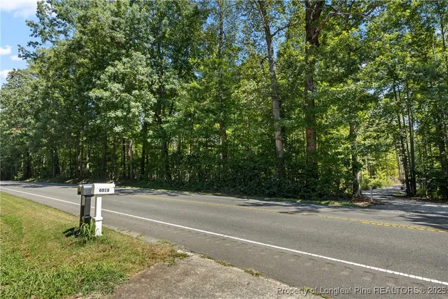 a street sign on a side of the road