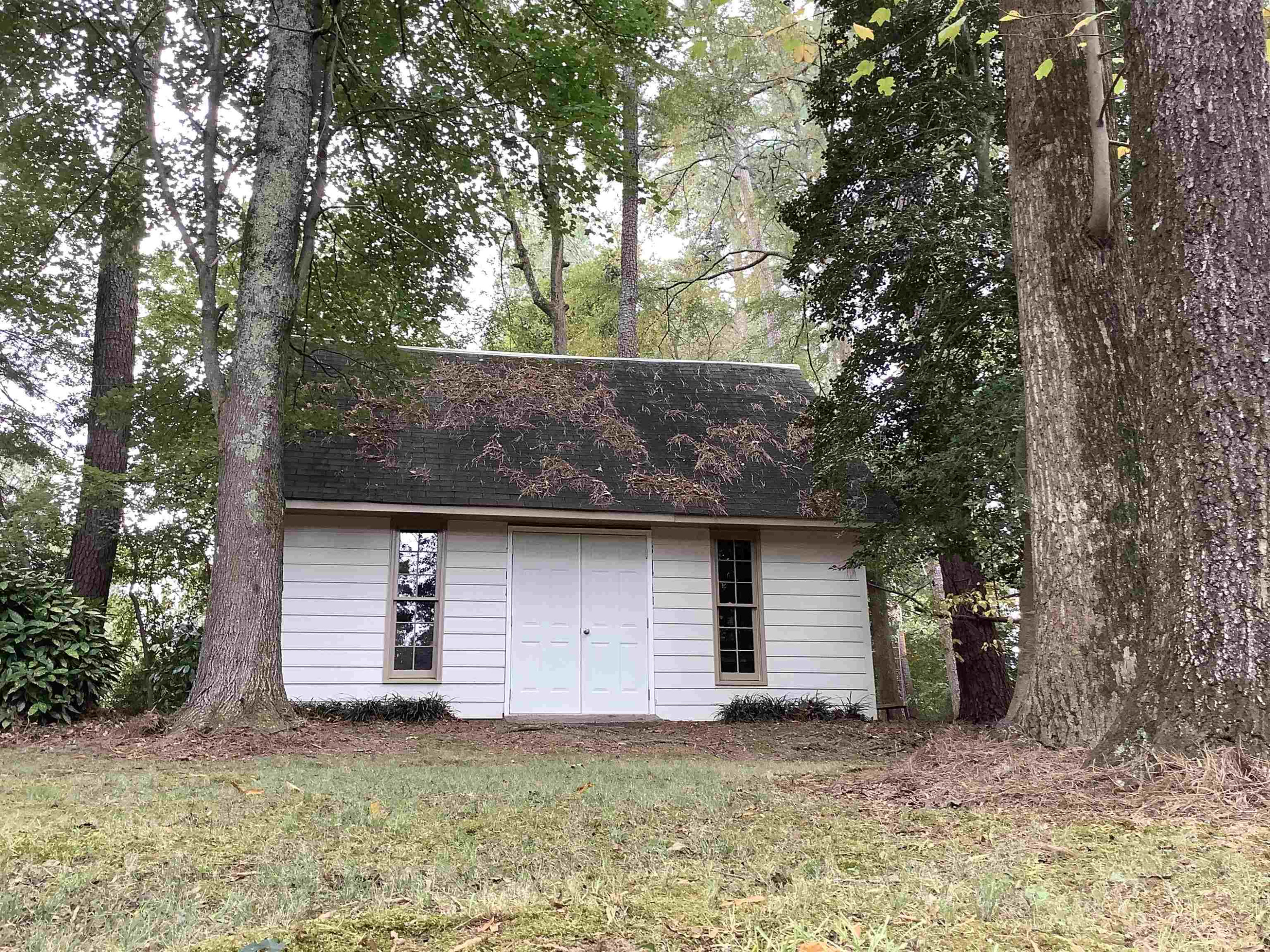 3 Gathering Place Raleigh, NC 27604 - Photo 23 of 57 a front view of a house with a yard