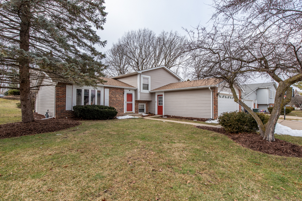 358 Teal Road Lindenhurst, IL 60046 - Photo 1 of 19 a view of a house with a yard and garage