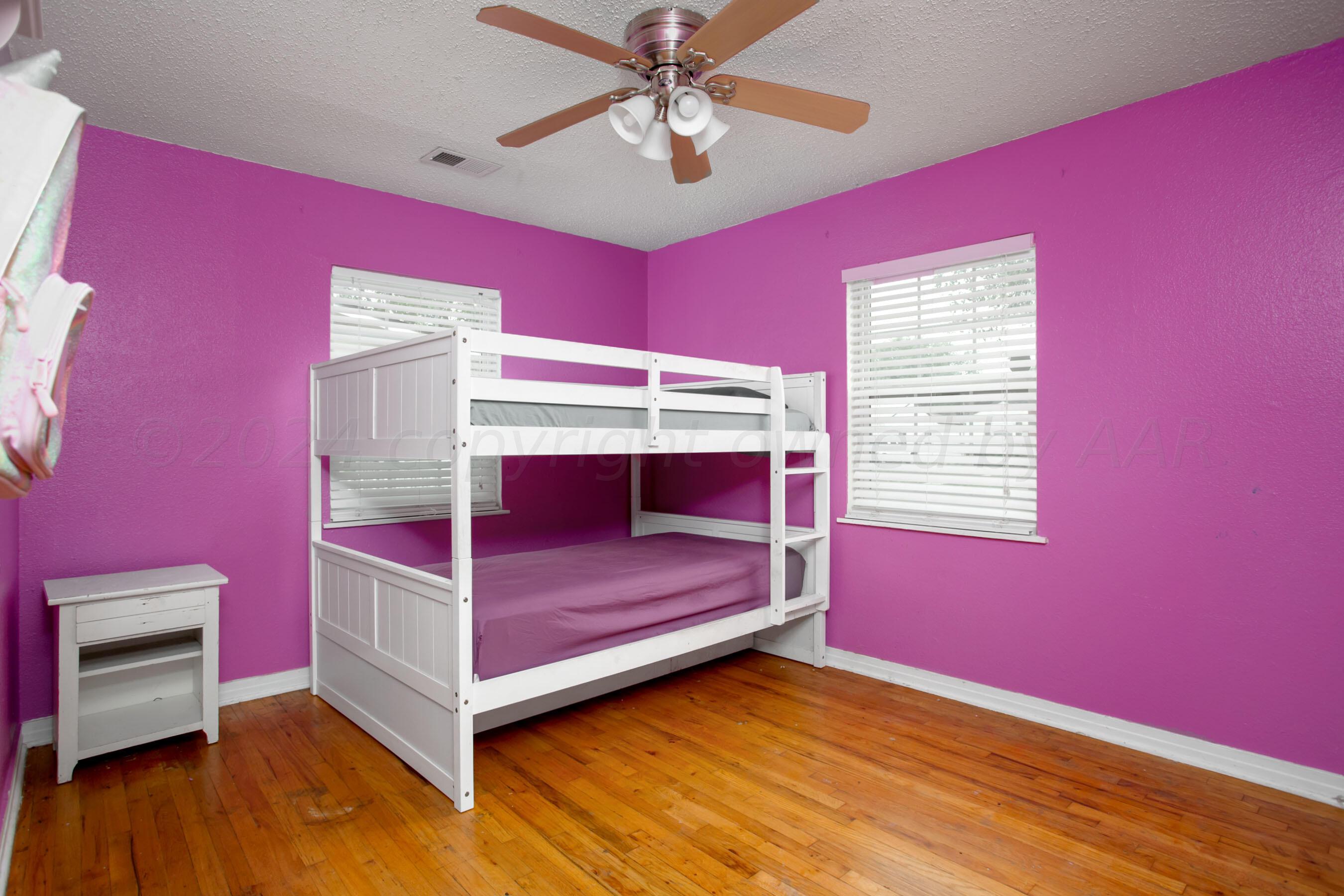 4205 South Ong Street Amarillo, TX 79110 - Photo 16 of 25 a bedroom with a bed and a window