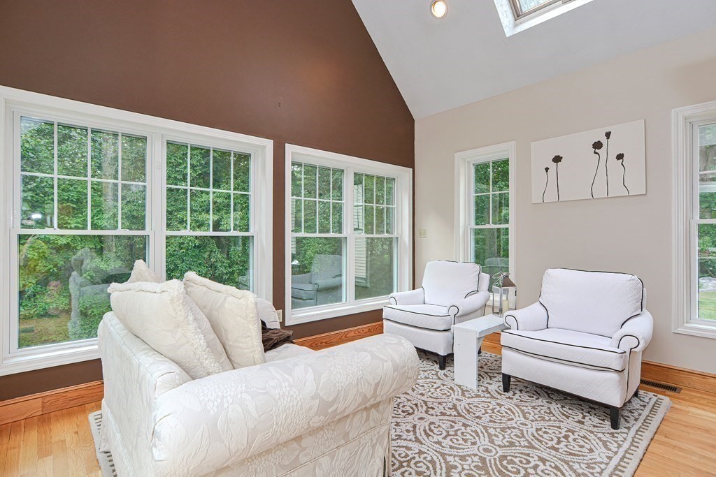 75 Alpine Drive Holliston, MA 01746 - Photo 18 of 42 a living room with furniture and a large window