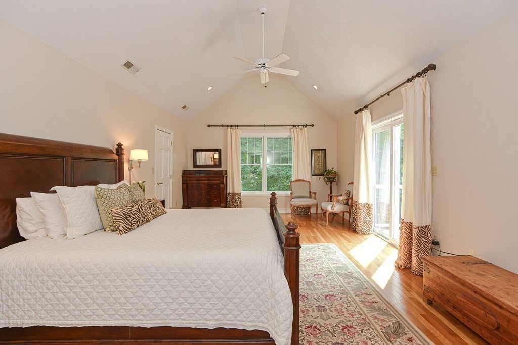 75 Alpine Drive Holliston, MA 01746 - Photo 24 of 42 a bedroom with a large bed and a large window