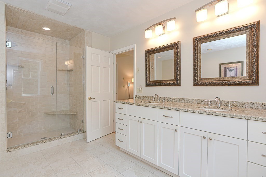 75 Alpine Drive Holliston, MA 01746 - Photo 28 of 42 a bathroom with a granite countertop sink mirror and double