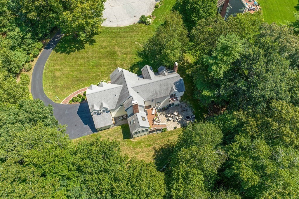 75 Alpine Drive Holliston, MA 01746 - Photo 4 of 42 an outdoor sitting area with golf course