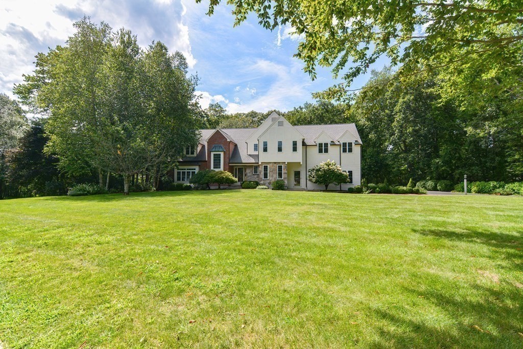 75 Alpine Drive Holliston, MA 01746 - Photo 41 of 42 a front view of house with yard and green space
