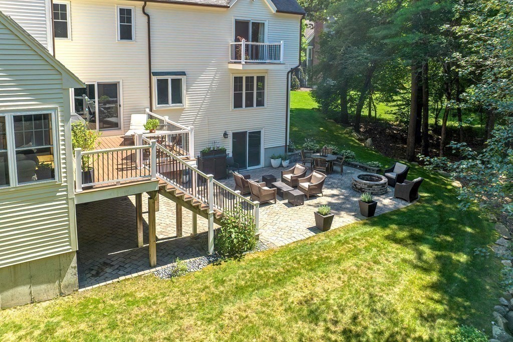 75 Alpine Drive Holliston, MA 01746 - Photo 6 of 42 a view of a house with backyard and sitting area