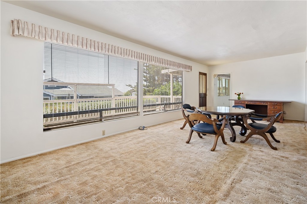 2275 Cass Avenue Cayucos, CA 93430 - Photo 20 of 60 a living room with furniture and a large window