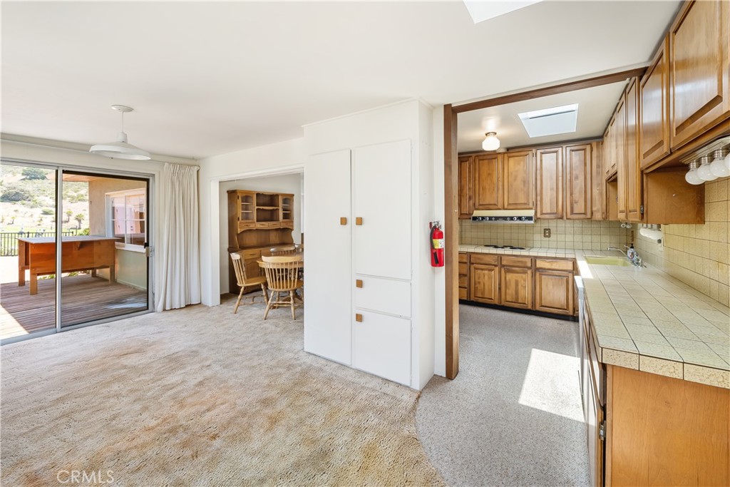 2275 Cass Avenue Cayucos, CA 93430 - Photo 32 of 60 a view of a kitchen with a sink and cabinets