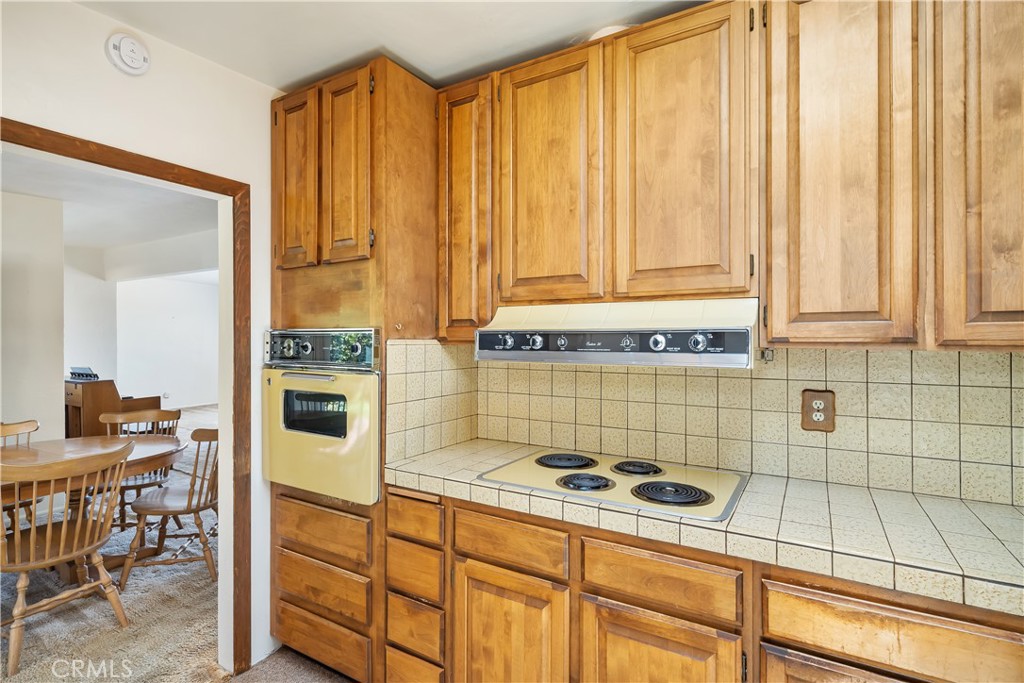 2275 Cass Avenue Cayucos, CA 93430 - Photo 35 of 60 a kitchen with stainless steel appliances a stove a refrigerator and cabinets