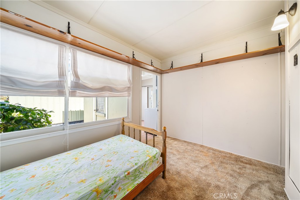 2275 Cass Avenue Cayucos, CA 93430 - Photo 40 of 60 a bedroom with a bed window and a shower