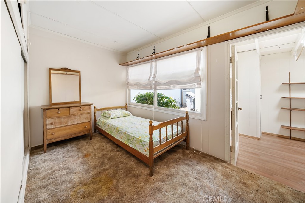 2275 Cass Avenue Cayucos, CA 93430 - Photo 41 of 60 a bedroom with a bed and a window