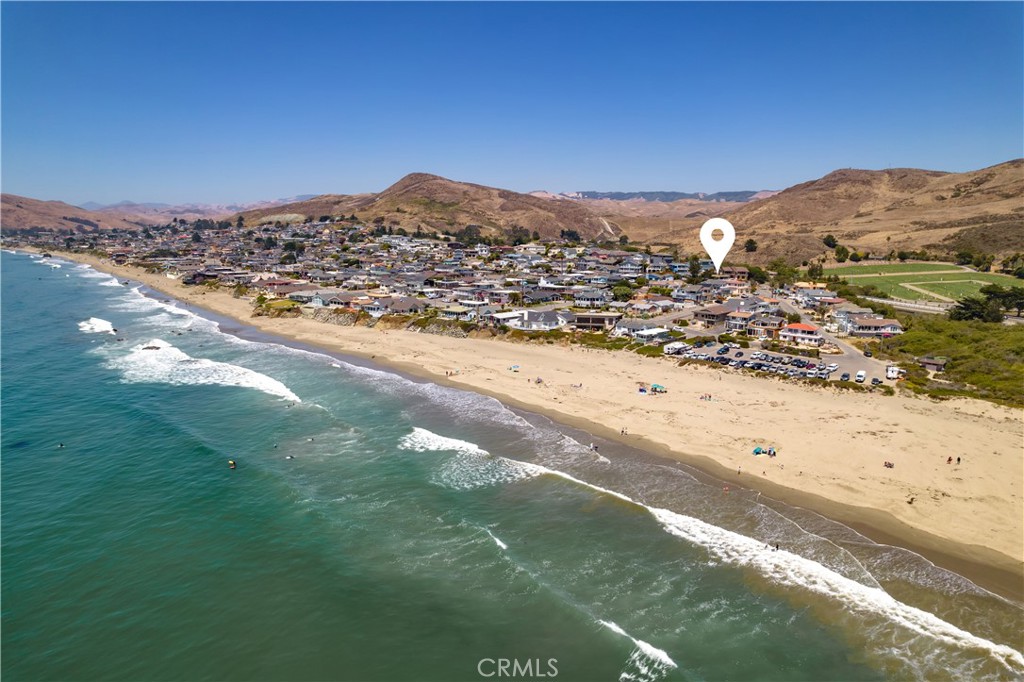 2275 Cass Avenue Cayucos, CA 93430 - Photo 53 of 60 a view of an ocean beach and mountain