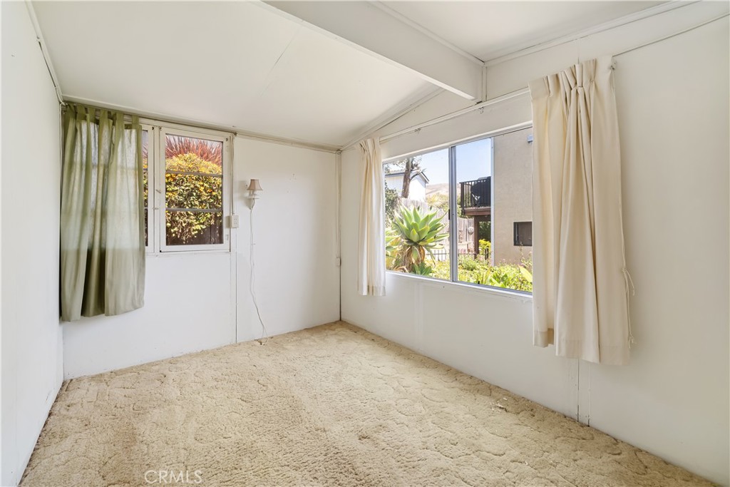 2275 Cass Avenue Cayucos, CA 93430 - Photo 54 of 60 a view of hallway with furniture and a window