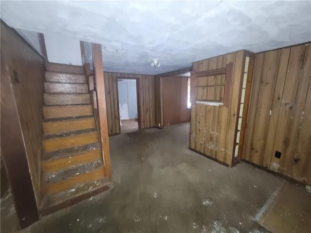 a view of a hallway with closet area