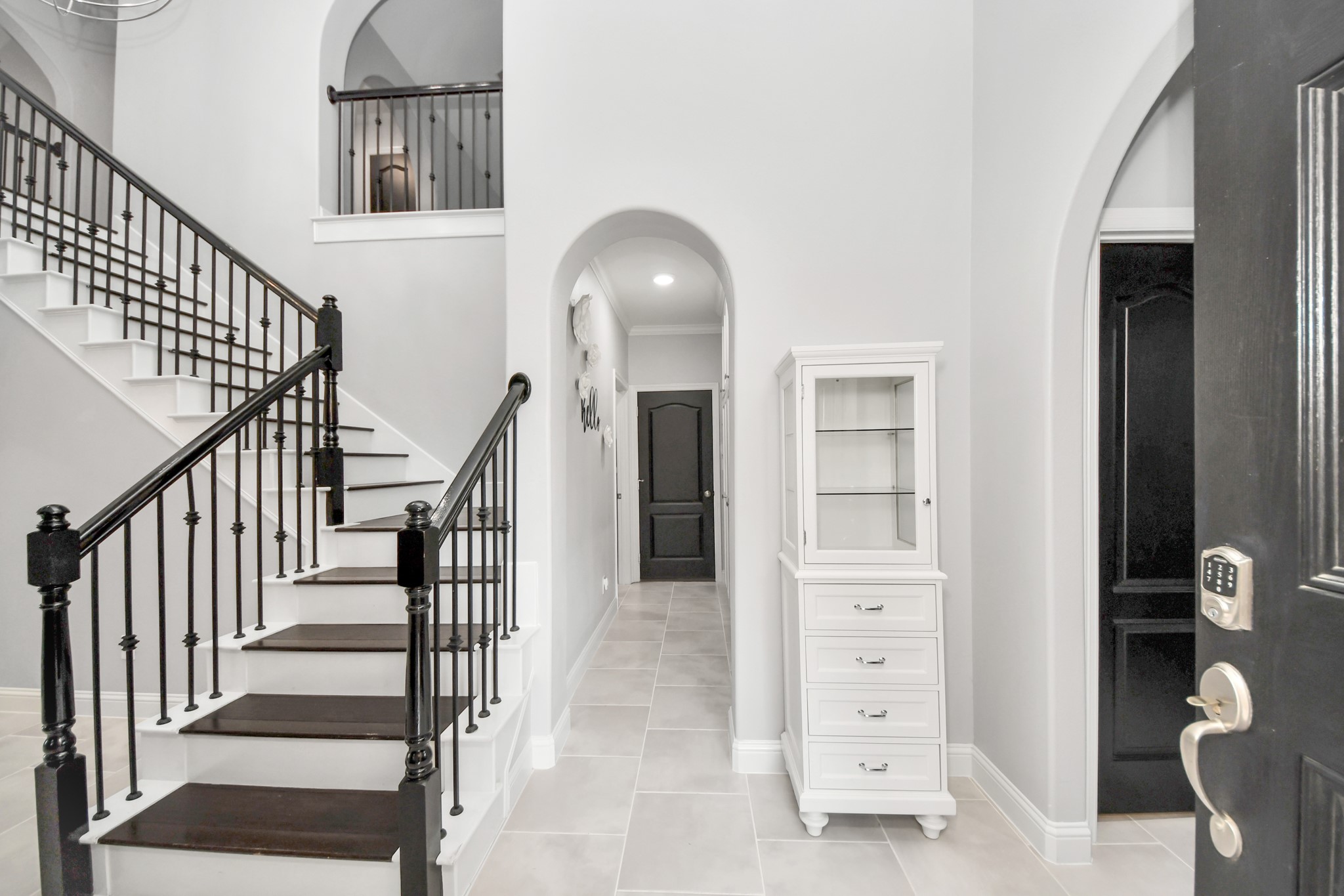 2811 Hadley Springs Lane Spring, TX 77386 - Photo 6 of 50 wooden floor in an entryway with a livingroom and stairs