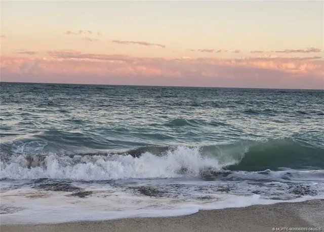 a view of a lake with a beach