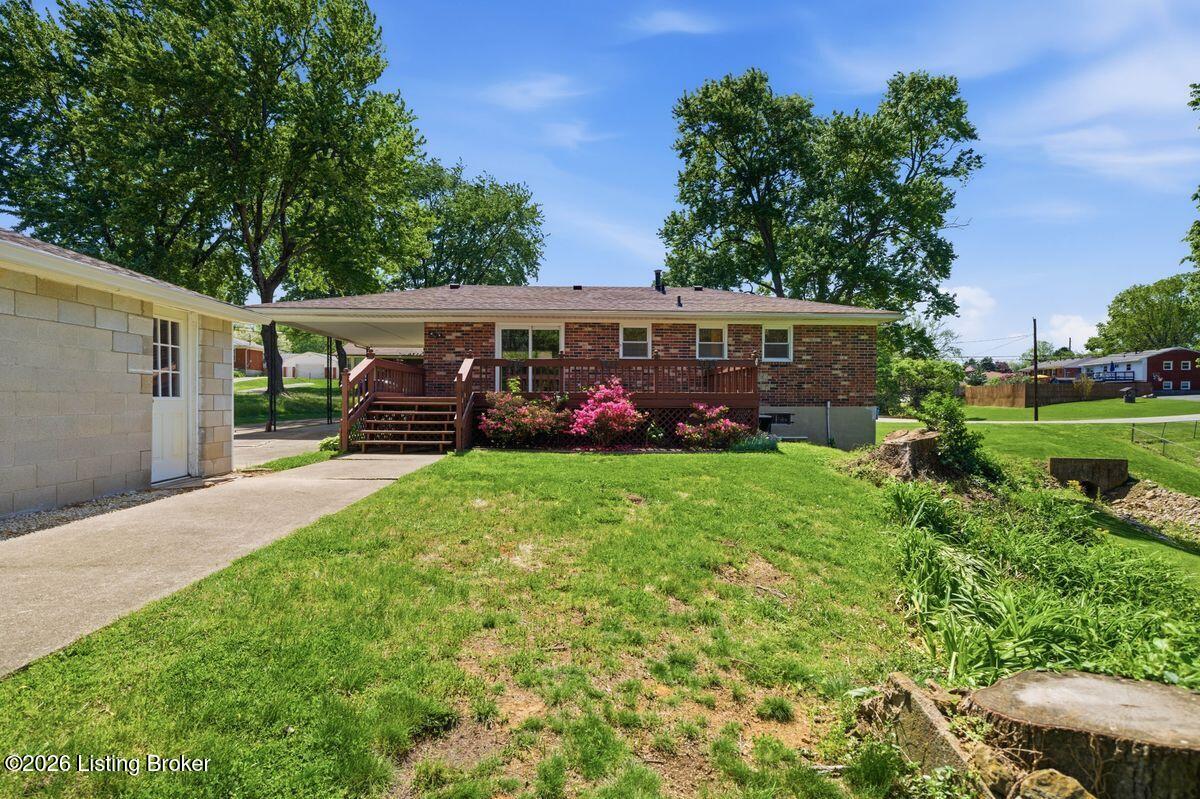 5503 Beth Road Louisville, KY 40219 - Photo 30 of 39 Concrete walking path next to garage for easy access