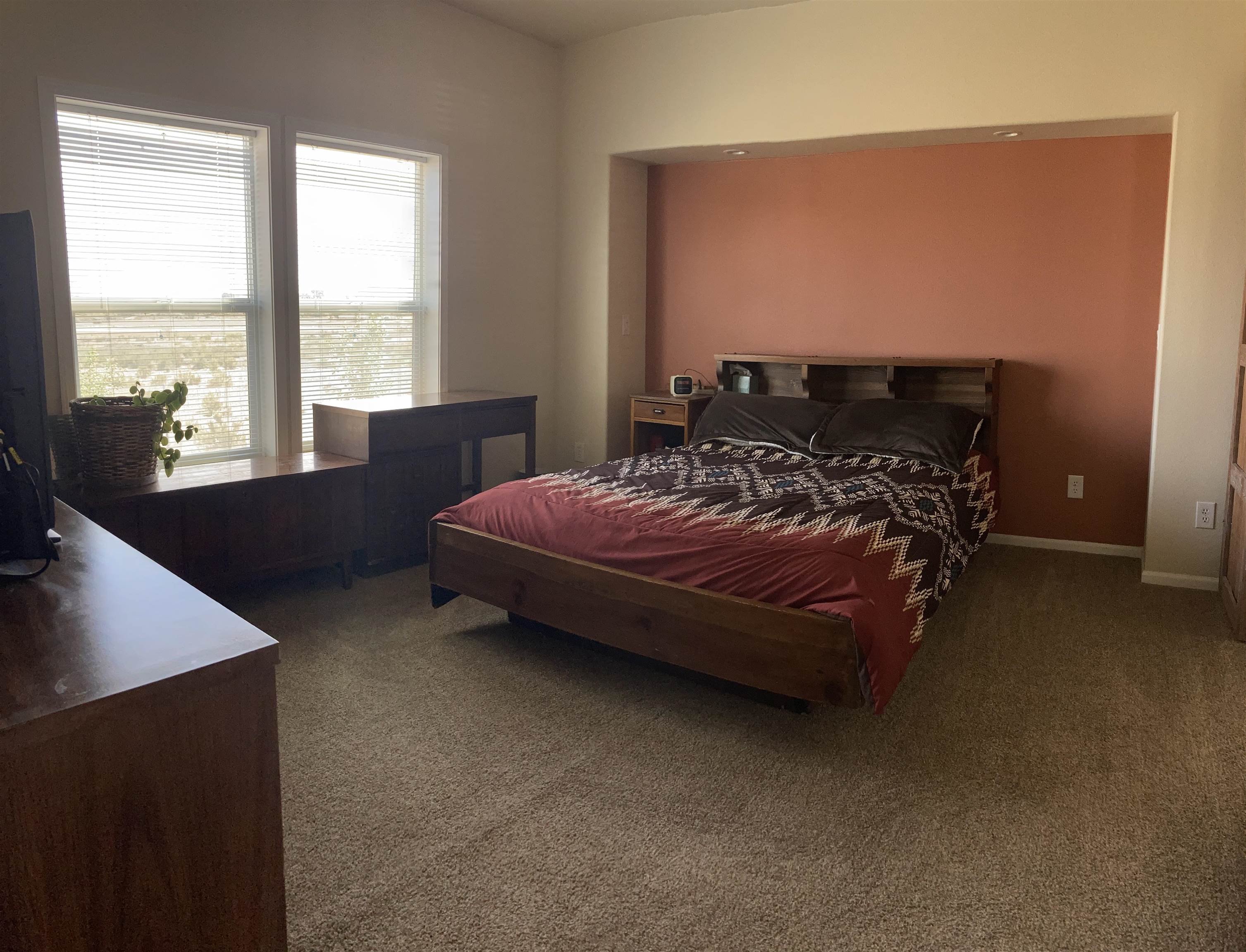 2413 1300th Road Delta, CO 81416 - Photo 15 of 35 a bedroom with a bed and window