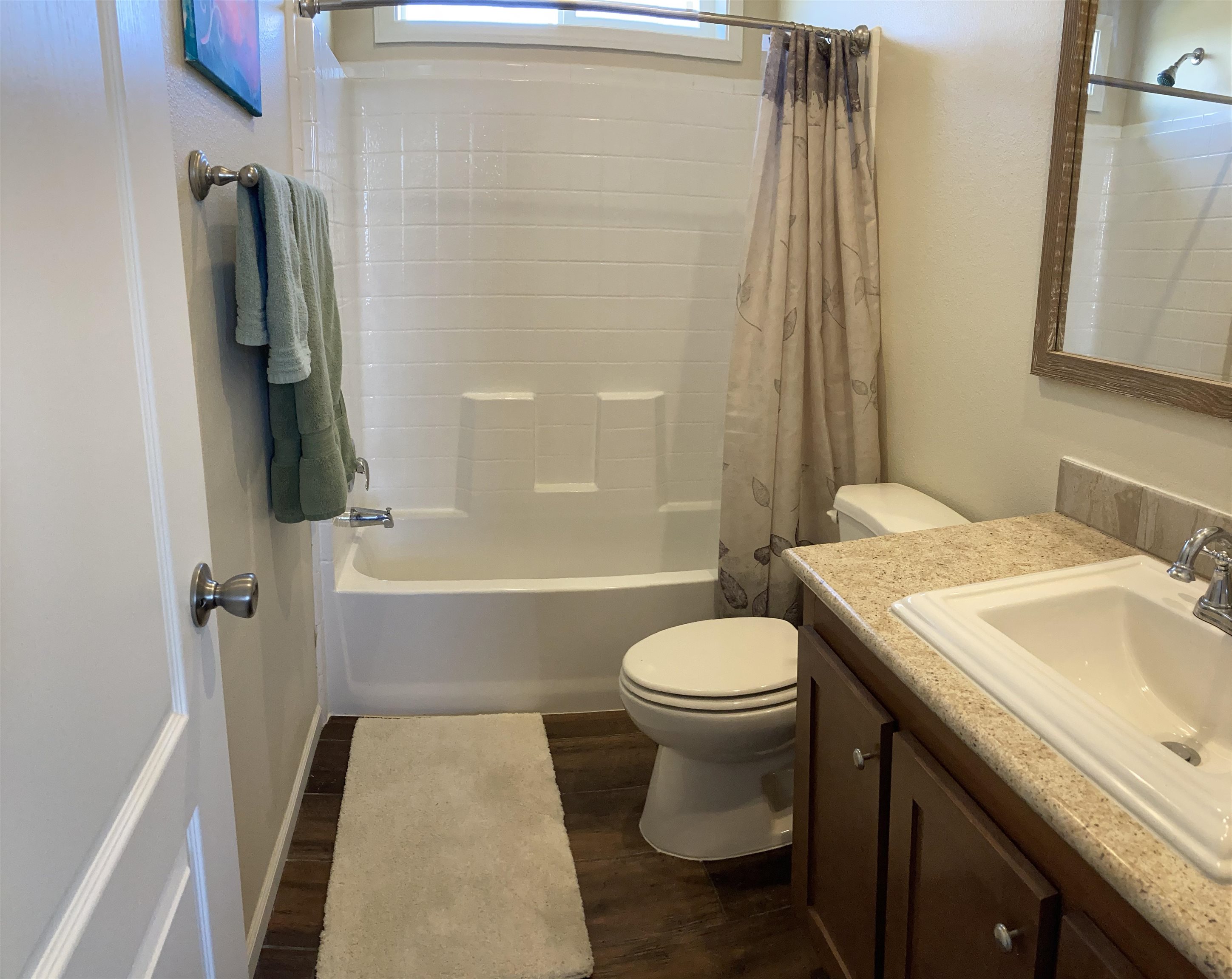 2413 1300th Road Delta, CO 81416 - Photo 21 of 35 a bathroom with a sink toilet and shower