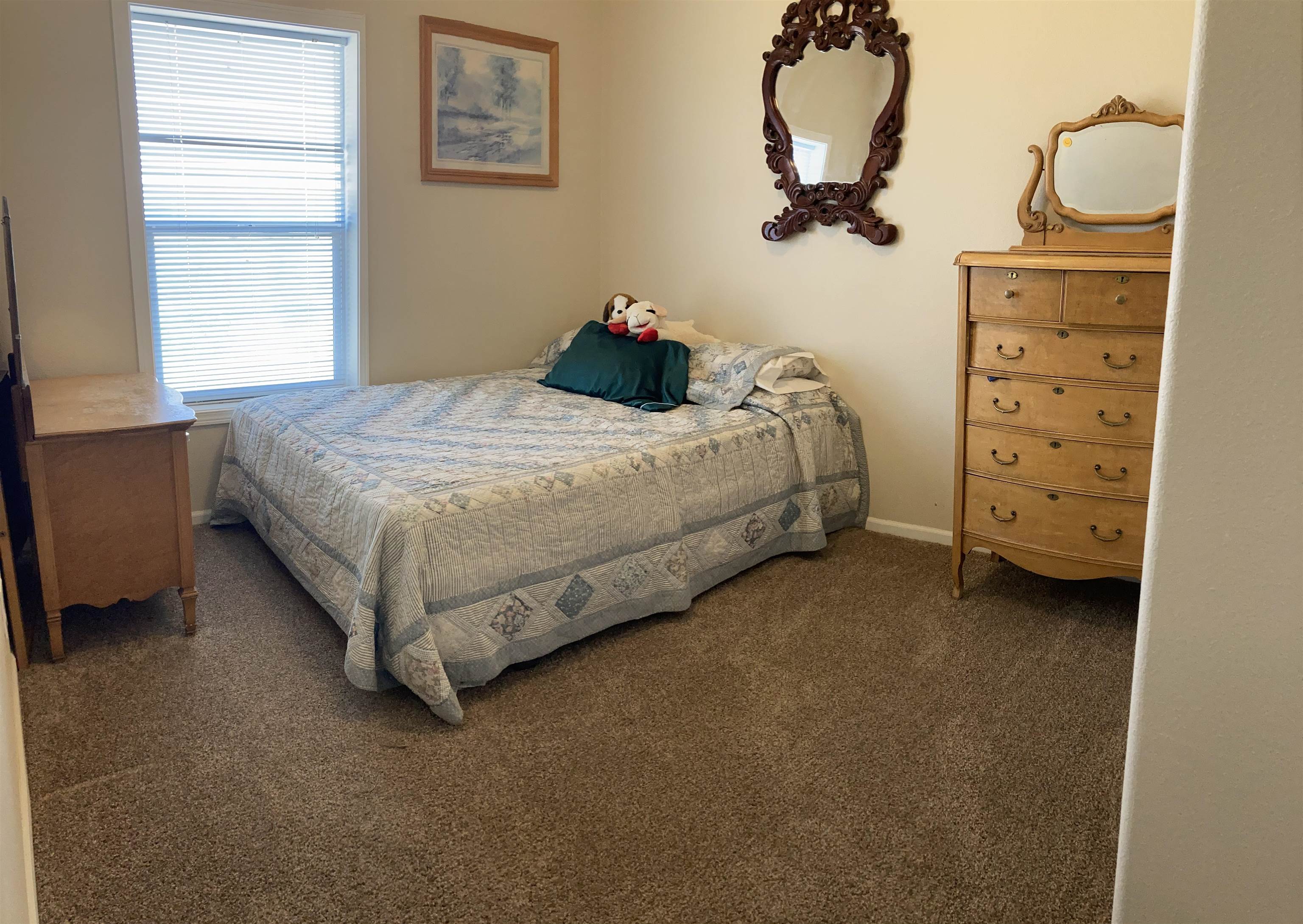 2413 1300th Road Delta, CO 81416 - Photo 22 of 35 a spacious bedroom with a bed and a window