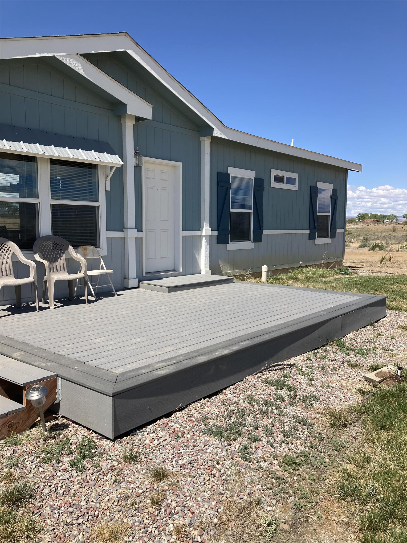 2413 1300th Road Delta, CO 81416 - Photo 34 of 35 a house with yard in front of it