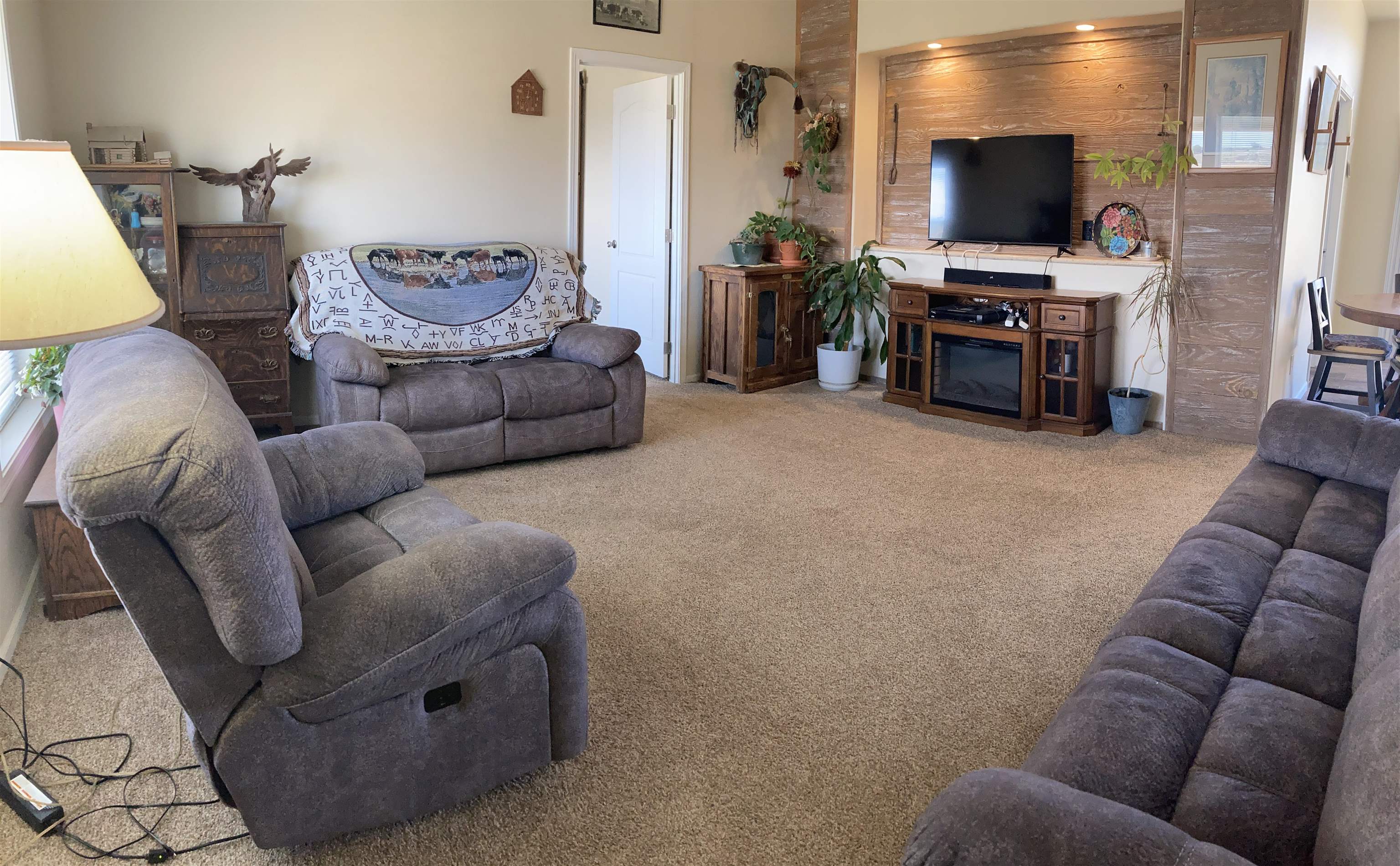 2413 1300th Road Delta, CO 81416 - Photo 5 of 35 a living room with furniture and a flat screen tv