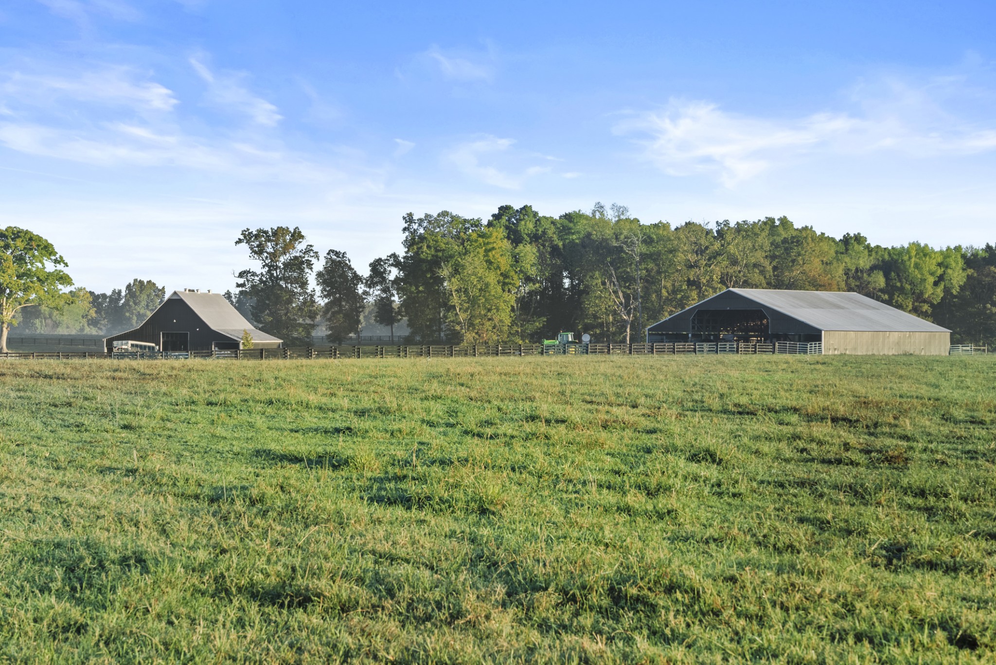 555 Williams Road Clarksville, TN 37043 - Photo 15 of 52 a view of a green field with an trees in the background