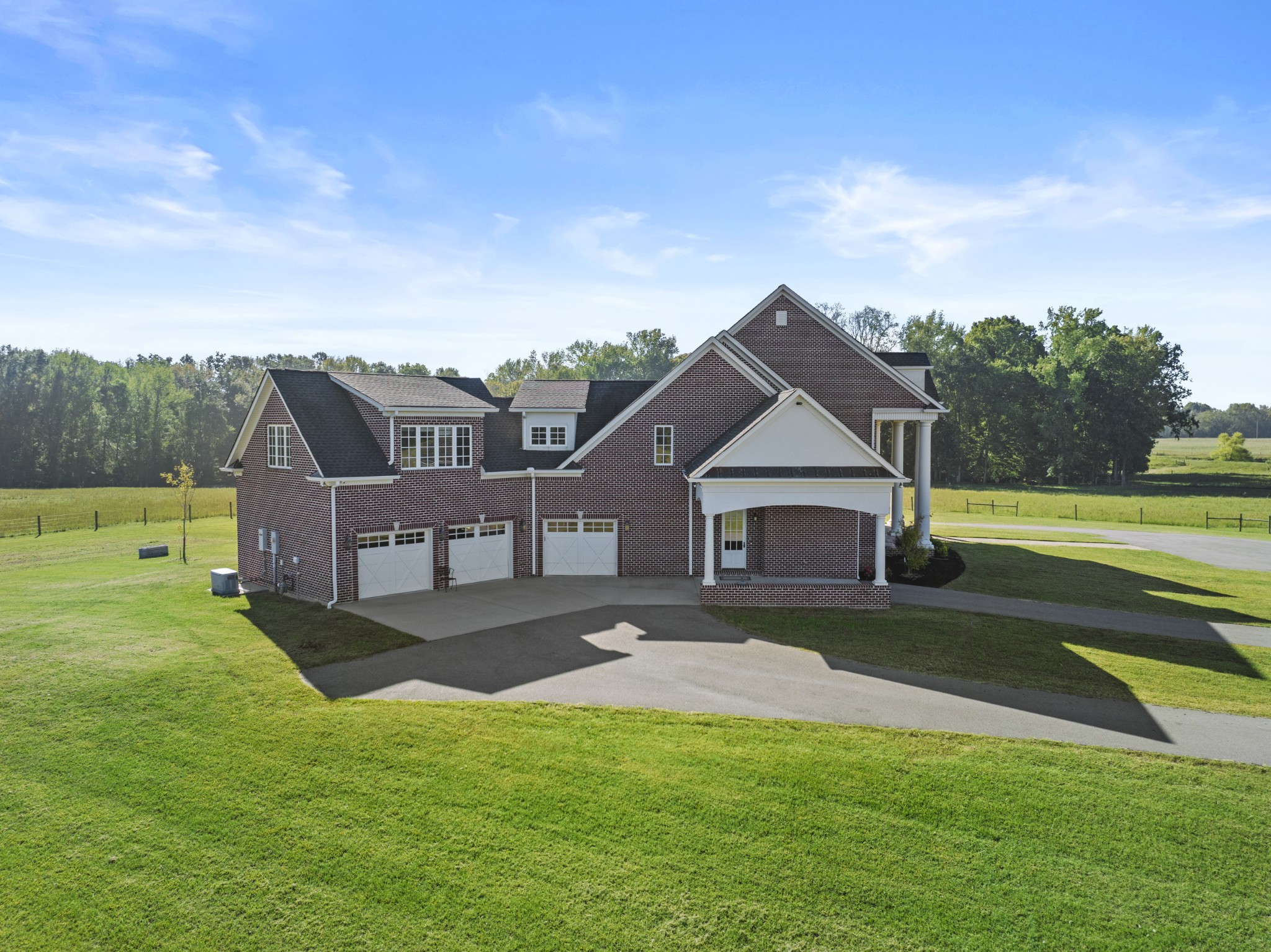 555 Williams Road Clarksville, TN 37043 - Photo 26 of 52 a view of a house with a big yard and a large tree