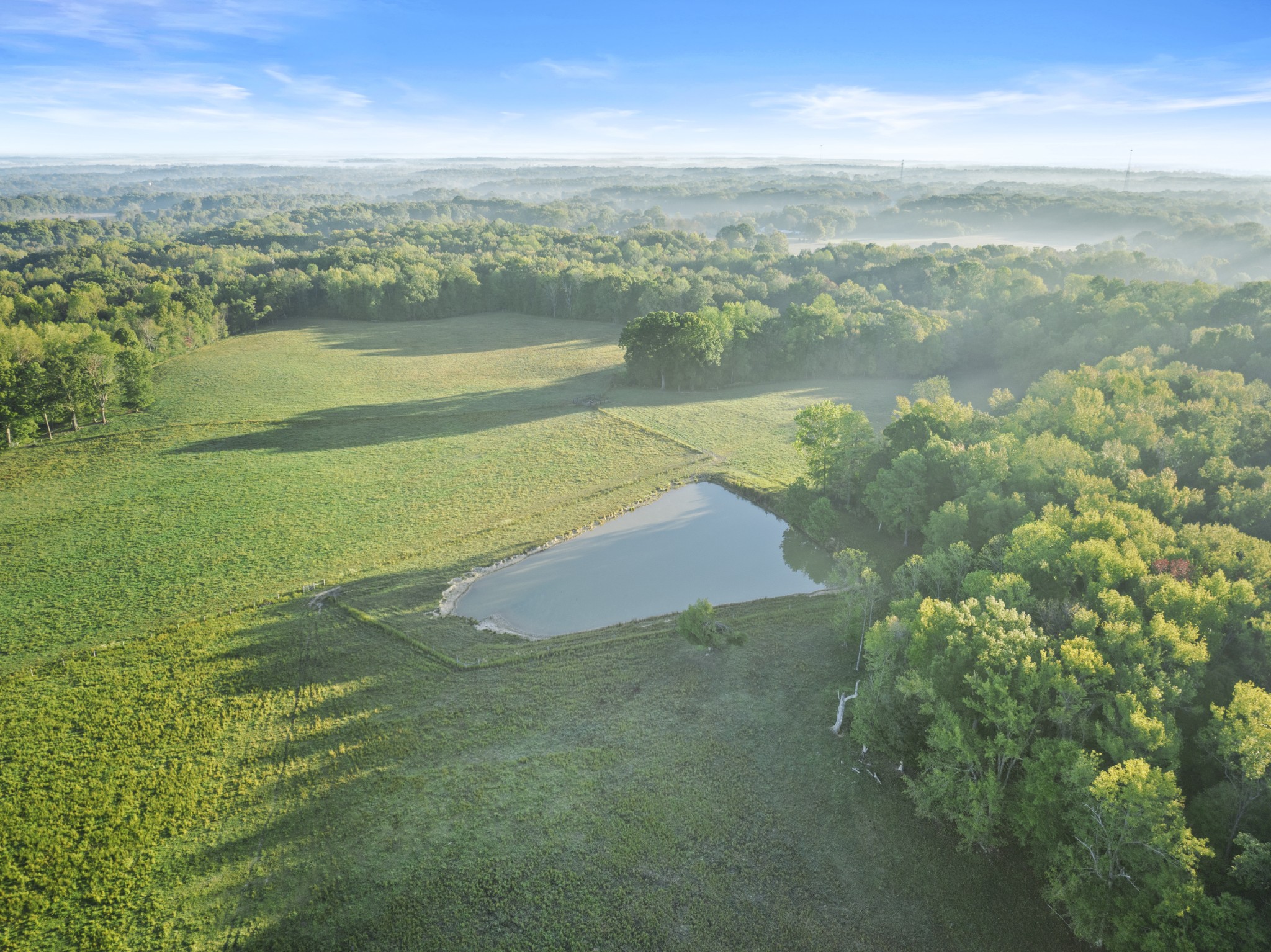 555 Williams Road Clarksville, TN 37043 - Photo 37 of 52 a view of a lake with a city