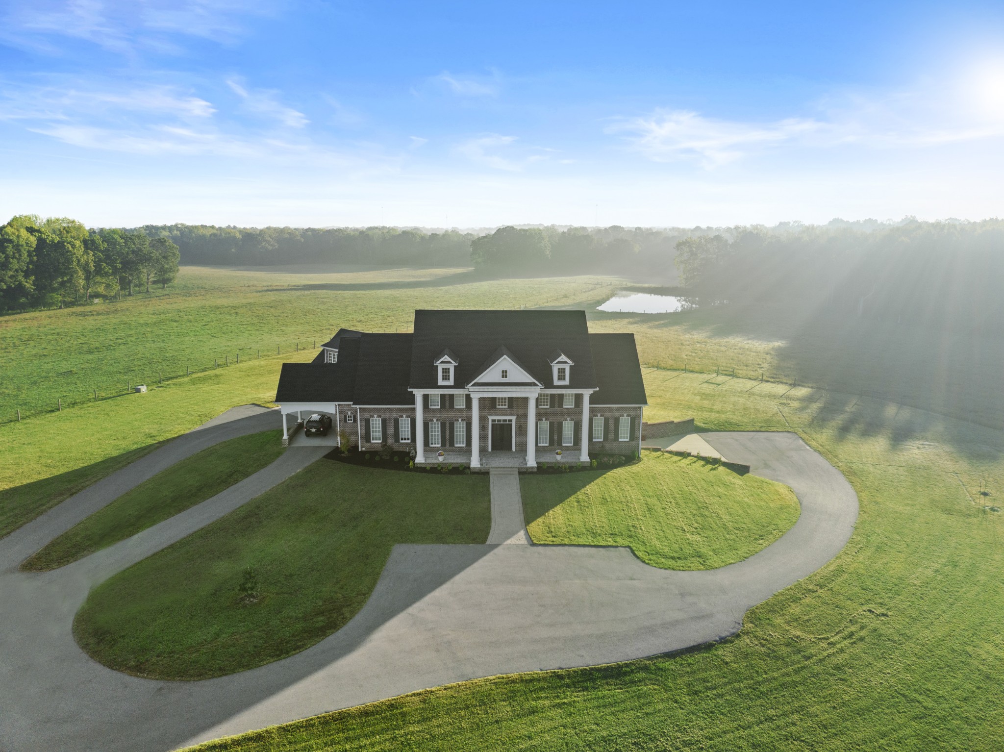 555 Williams Road Clarksville, TN 37043 - Photo 38 of 52 an aerial view of a house with outdoor space swimming pool and lake view