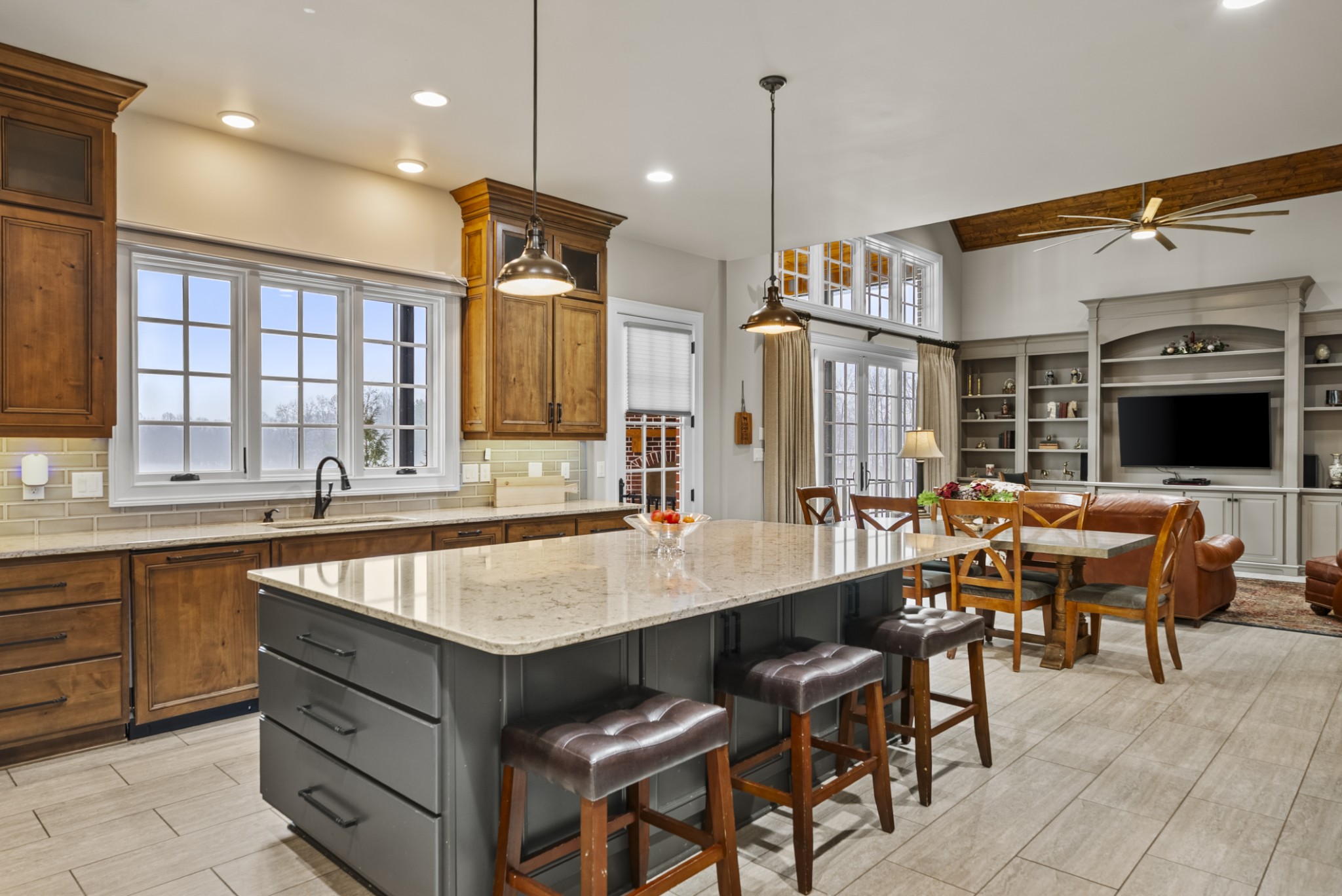 555 Williams Road Clarksville, TN 37043 - Photo 45 of 52 a kitchen with a table chairs sink and wooden floor