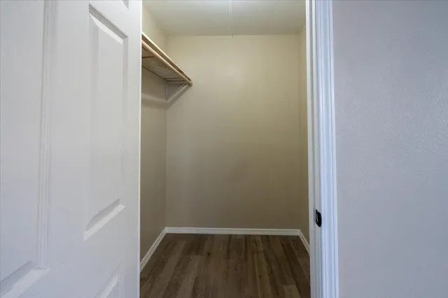 a view of a livingroom from a hallway
