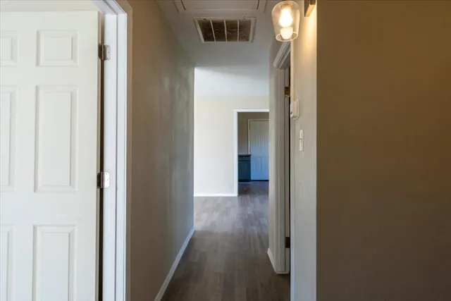 a view of a house with yard and garden