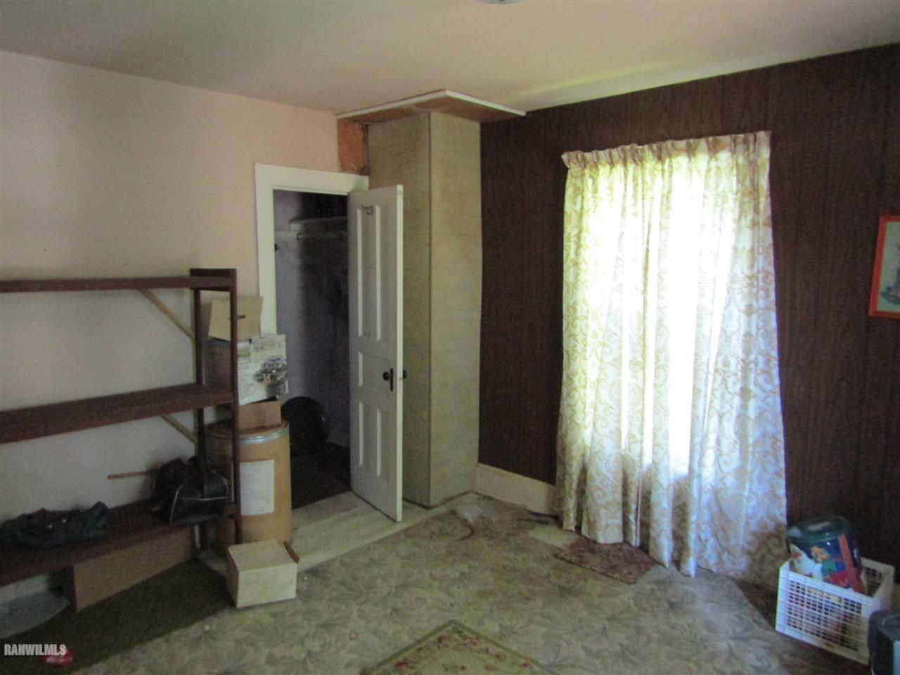 106 3rd Street East Ridott, IL 61067 - Photo 15 of 19 a view of an empty room with a window