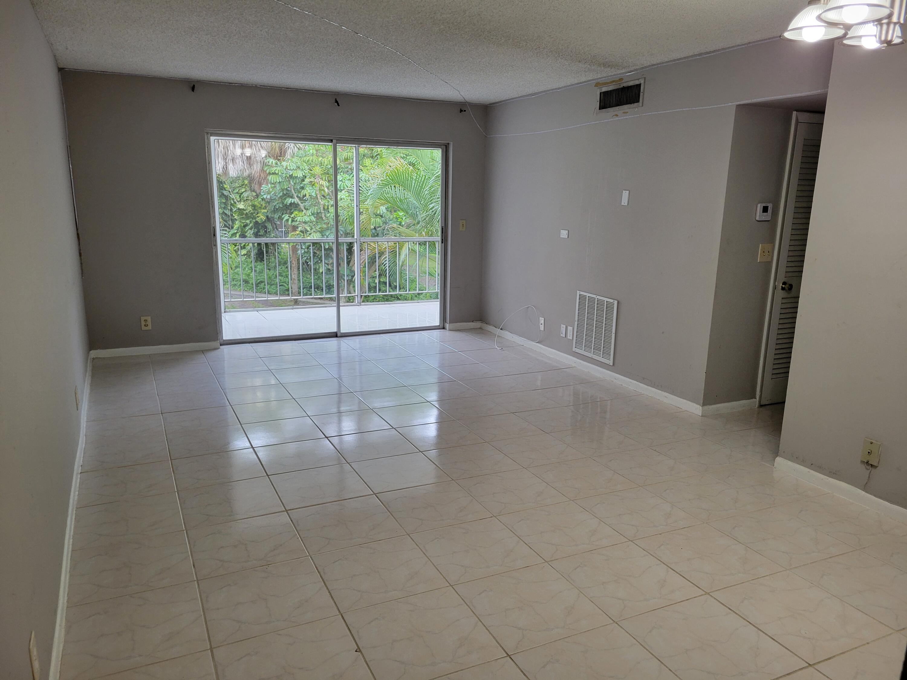 606 Northwest 13th Street, Unit 26 Boca Raton, FL 33486 - Photo 3 of 13 20240121_142342