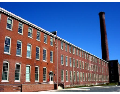 35 Riverwalk Way, Unit R315 Lowell, MA 01854 - Photo 1 of 1 a large building with a street