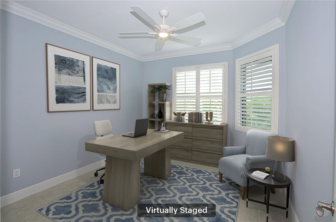 6145 Bella Rosa Lane Vero Beach, FL 32966 - Photo 23 of 36 a dining room with furniture and a window