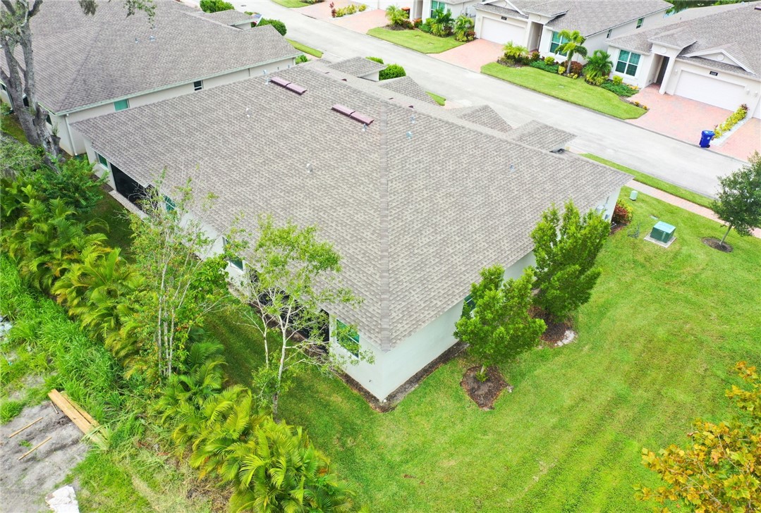 6145 Bella Rosa Lane Vero Beach, FL 32966 - Photo 31 of 36 an aerial view of a house