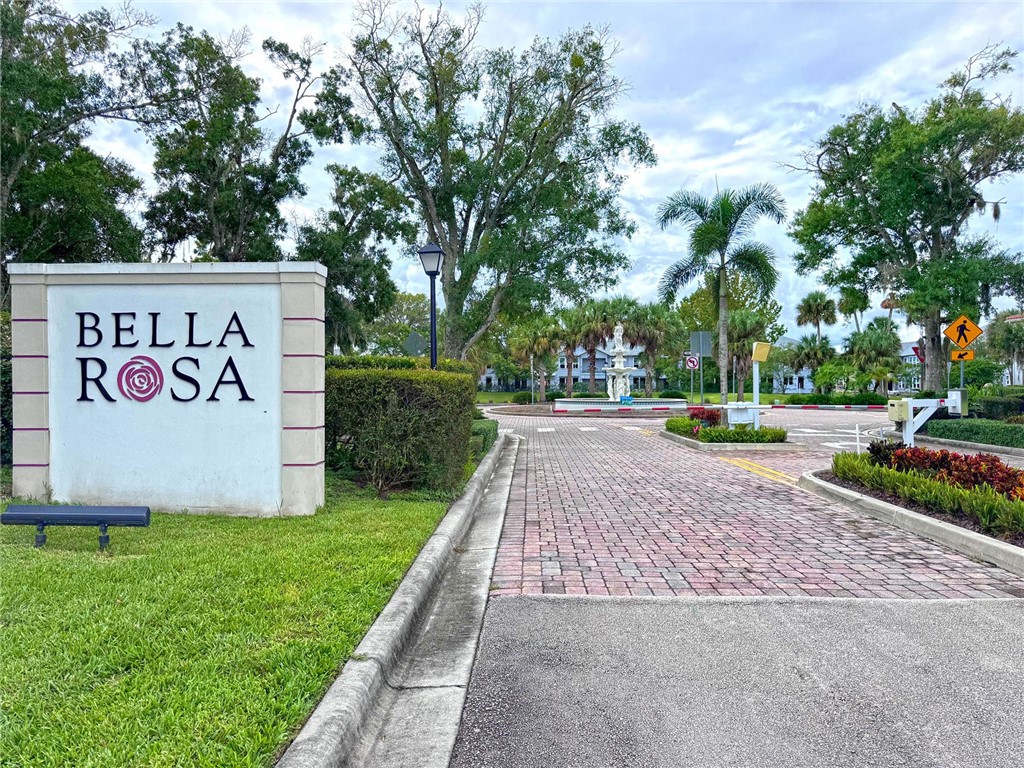 6145 Bella Rosa Lane Vero Beach, FL 32966 - Photo 35 of 36 a sign on the side of the road