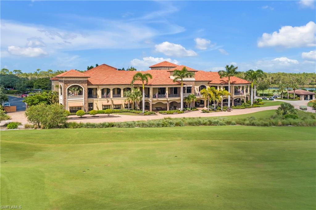 9719 Acqua Court, Unit 214 Naples, FL 34113 - Photo 43 of 50 Main Clubhouse & TPC Golf Course