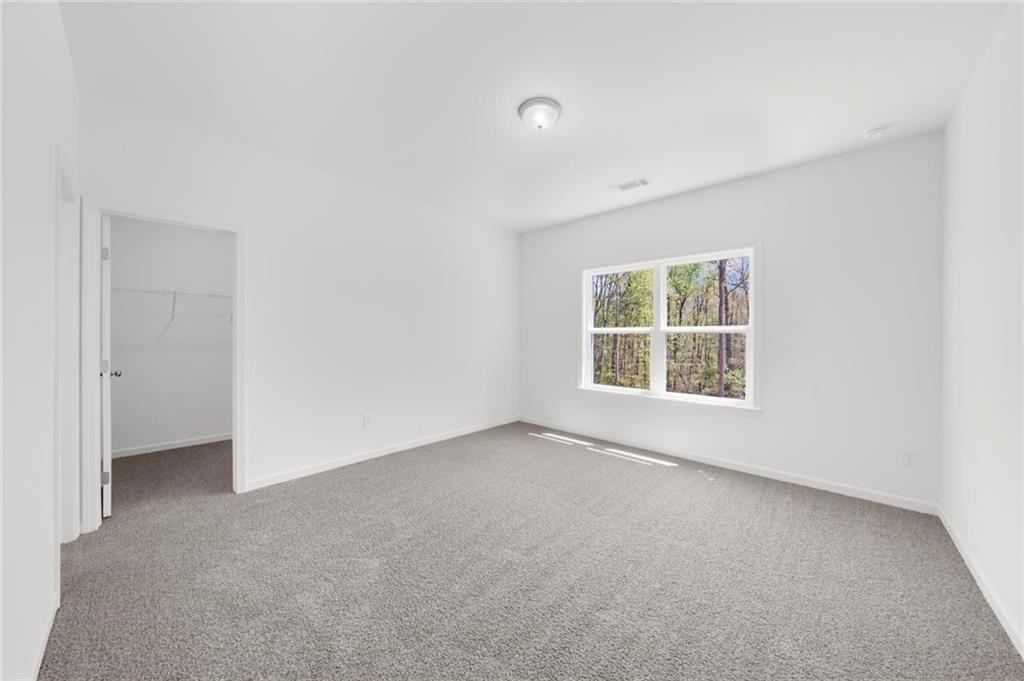 8915 Bethel Road Gainesville, GA 30506 - Photo 43 of 54 an empty room with a window