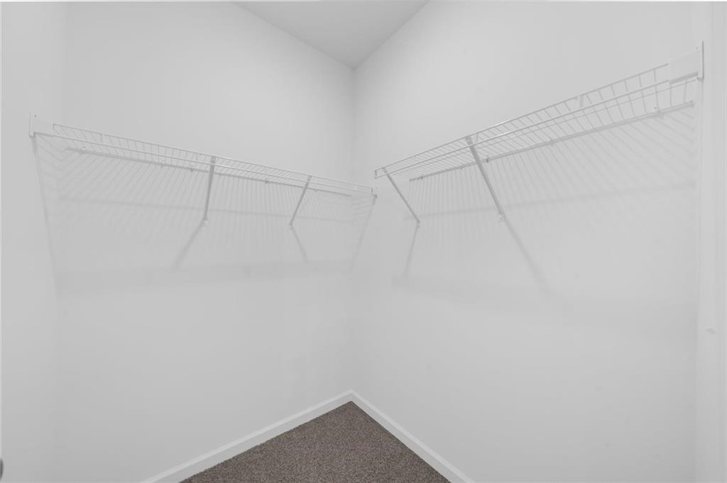 8915 Bethel Road Gainesville, GA 30506 - Photo 45 of 54 a view of a room with racks on the wall