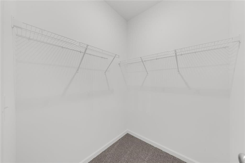 8915 Bethel Road Gainesville, GA 30506 - Photo 48 of 54 a view of a room with racks on the wall