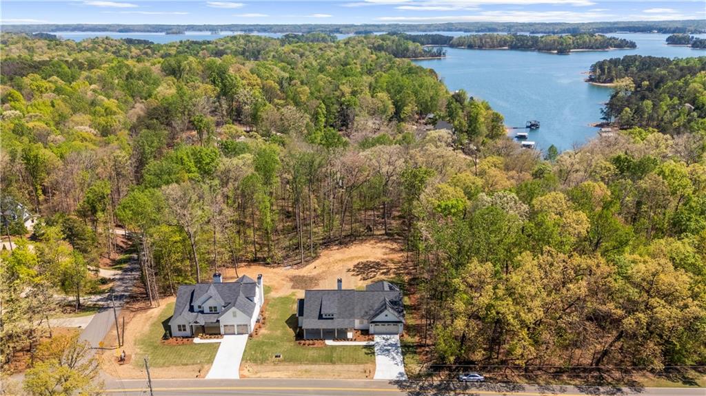 8915 Bethel Road Gainesville, GA 30506 - Photo 53 of 54 an aerial view of residential houses with outdoor space