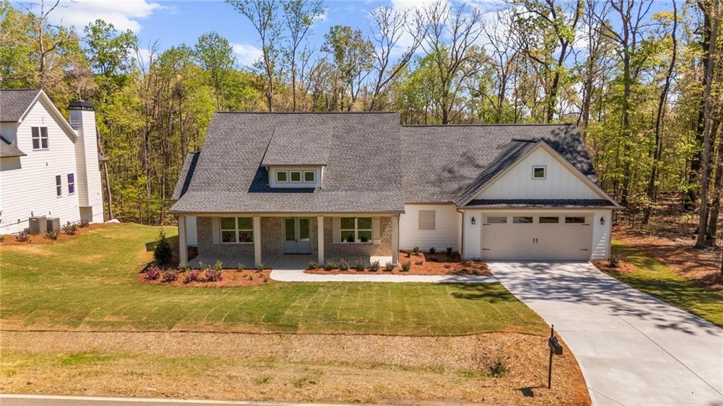 8915 Bethel Road Gainesville, GA 30506 - Photo 10 of 54 front view of house with a yard